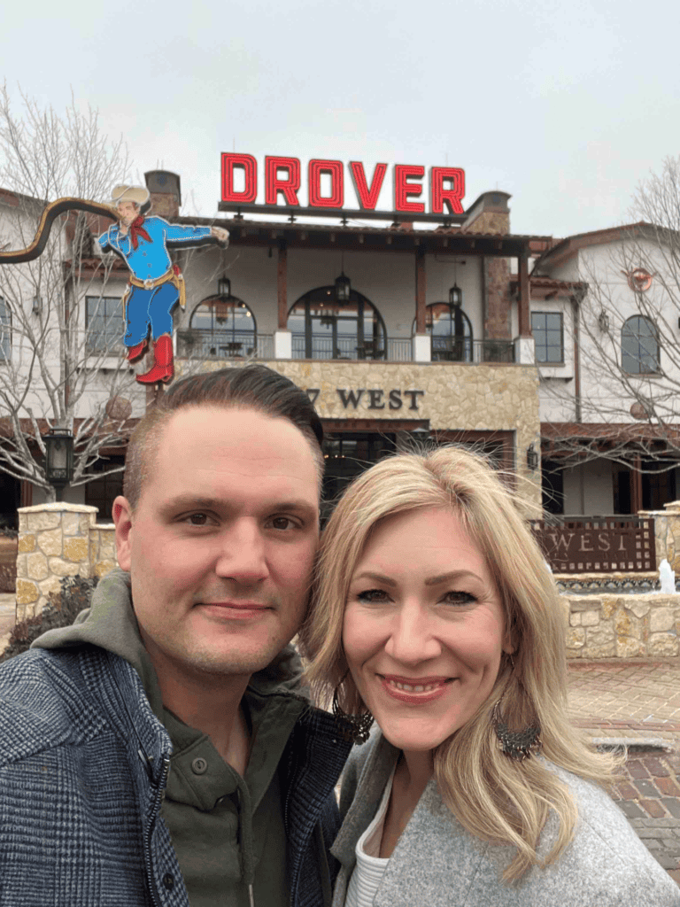 Man and woman outside drover hotel 