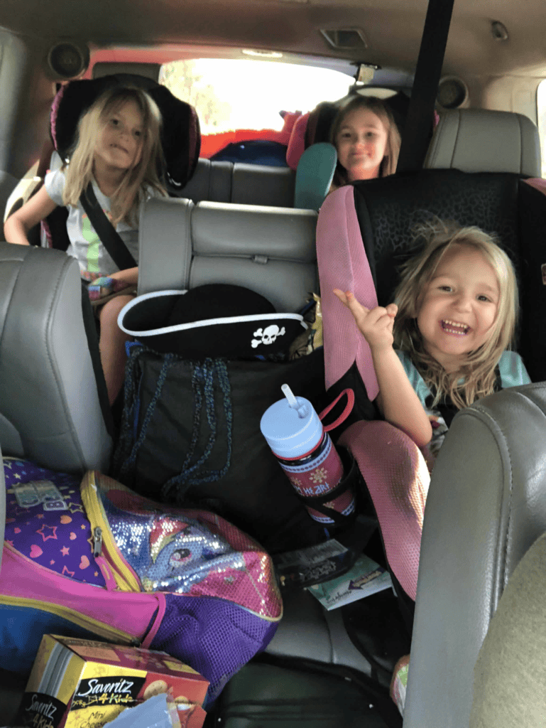 3 girls on roadtrip in car